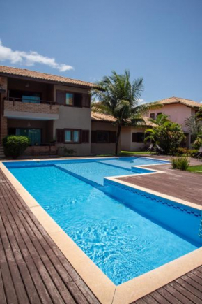 A 450m da PRAIA de TAPERAPUAN, no 2 pavimento, Piscina, Churrasqueira, 2 quartos, até 6 pessoas, WiFi independente 300 mbs, Estacionamento Gratuito para 1 carro, Próximo a mercado e restaurantes